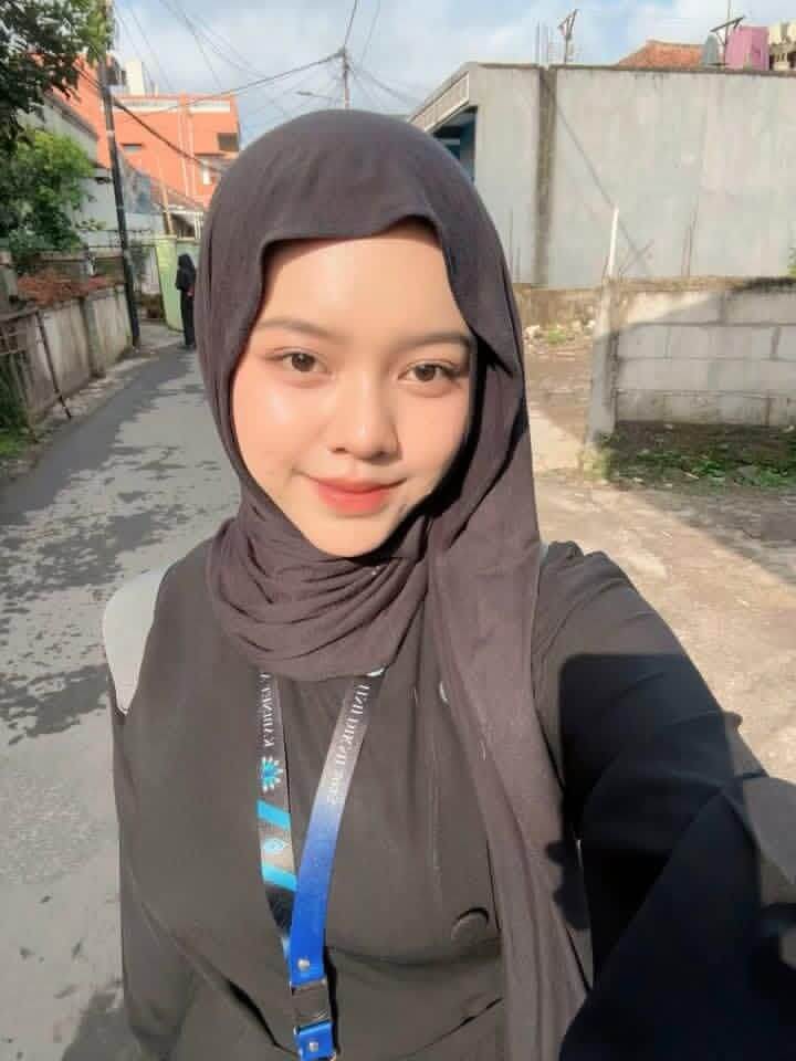 Dini Suhartini